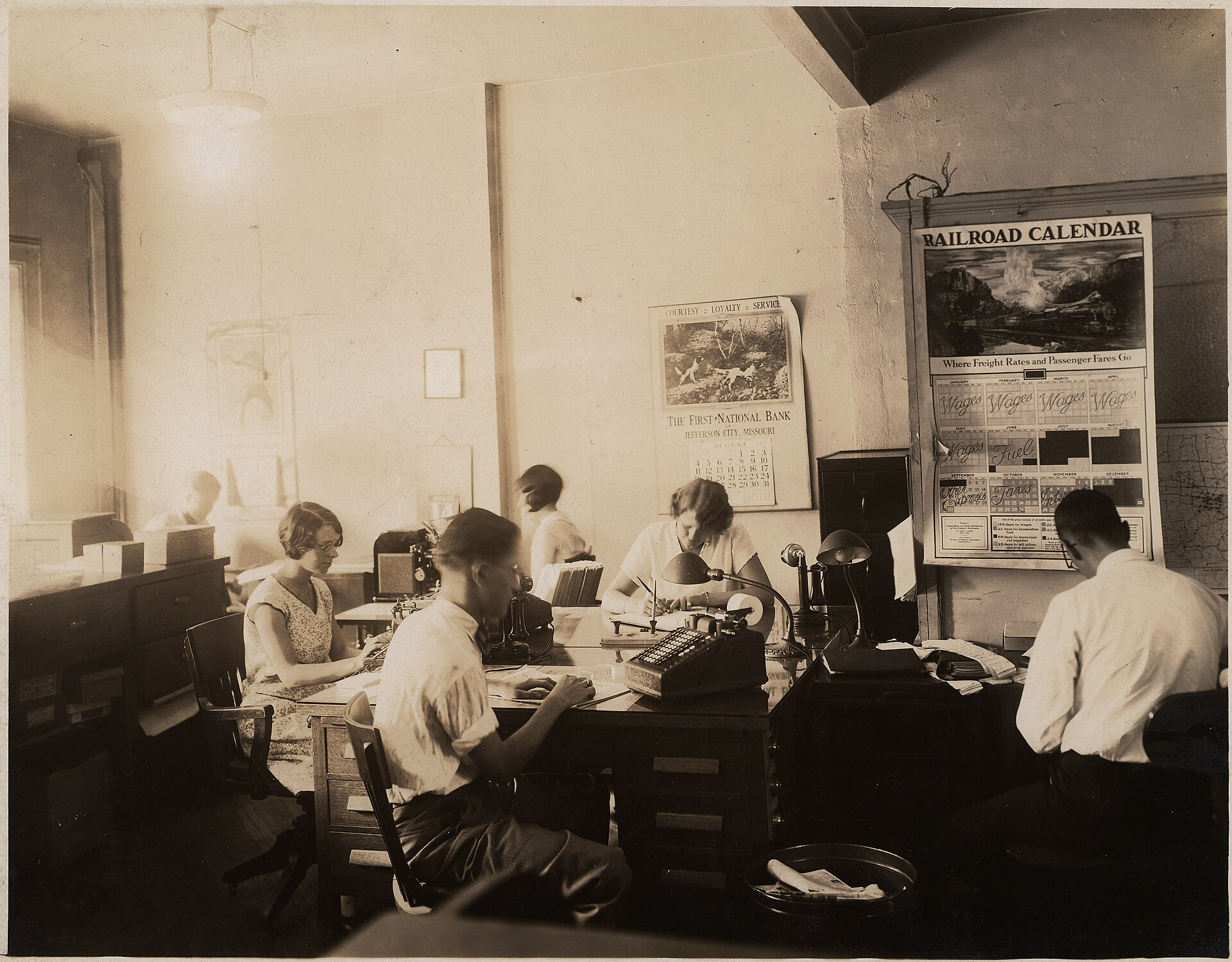 Old office with employees working at their desks